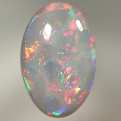 SOLID SEMI BLACK OPAL Bright crisp rolling flashes. Fire red, neon yellow, green and blue